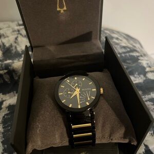 Bulova gold and black watch